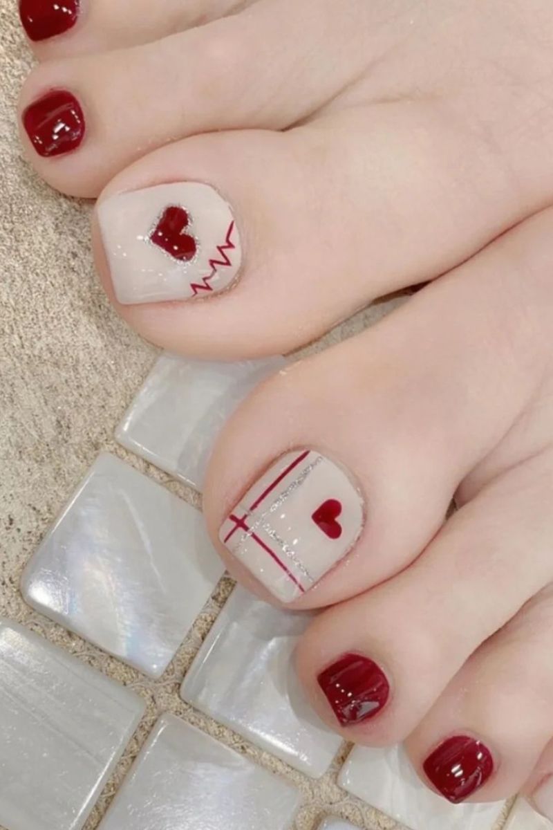 Ảnh mẫu nail chân màu đỏ mận 14