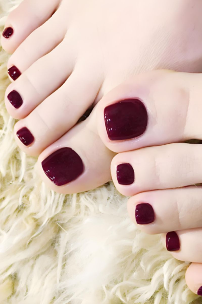 Ảnh mẫu nail chân màu đỏ mận 7