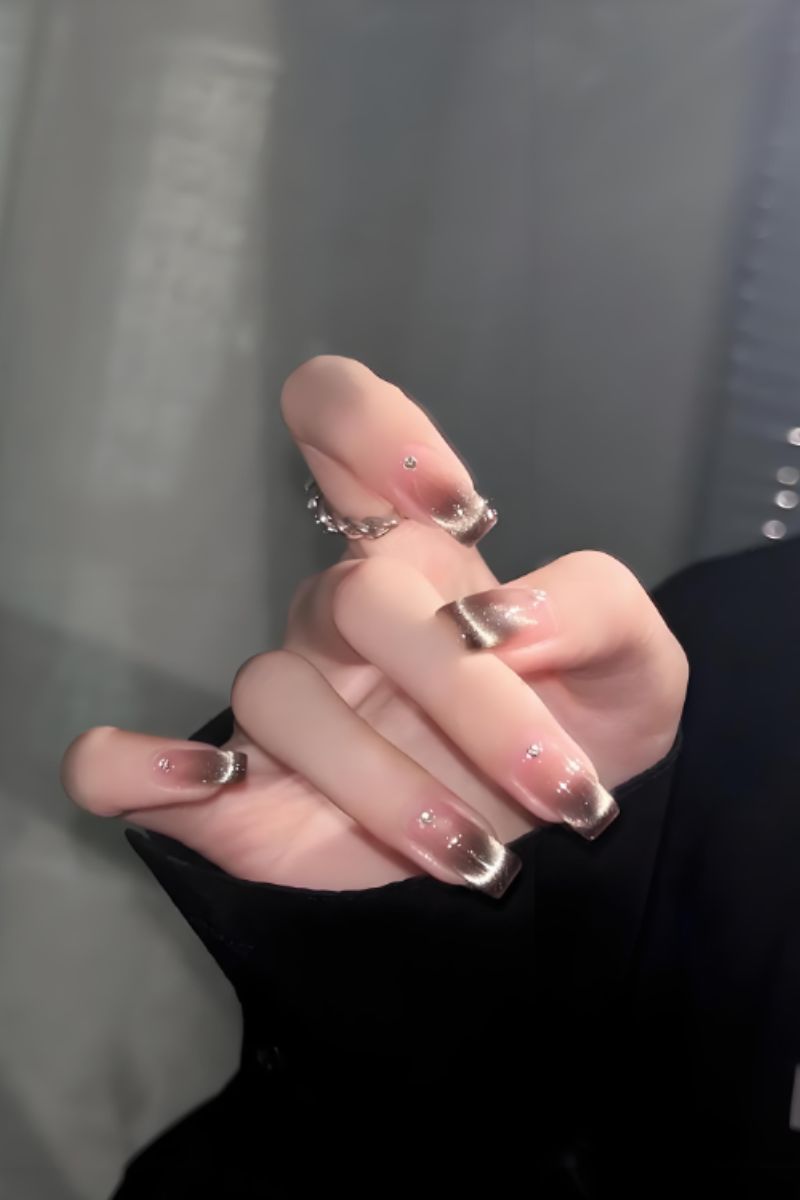 Ảnh nail tay mắt mèo 5