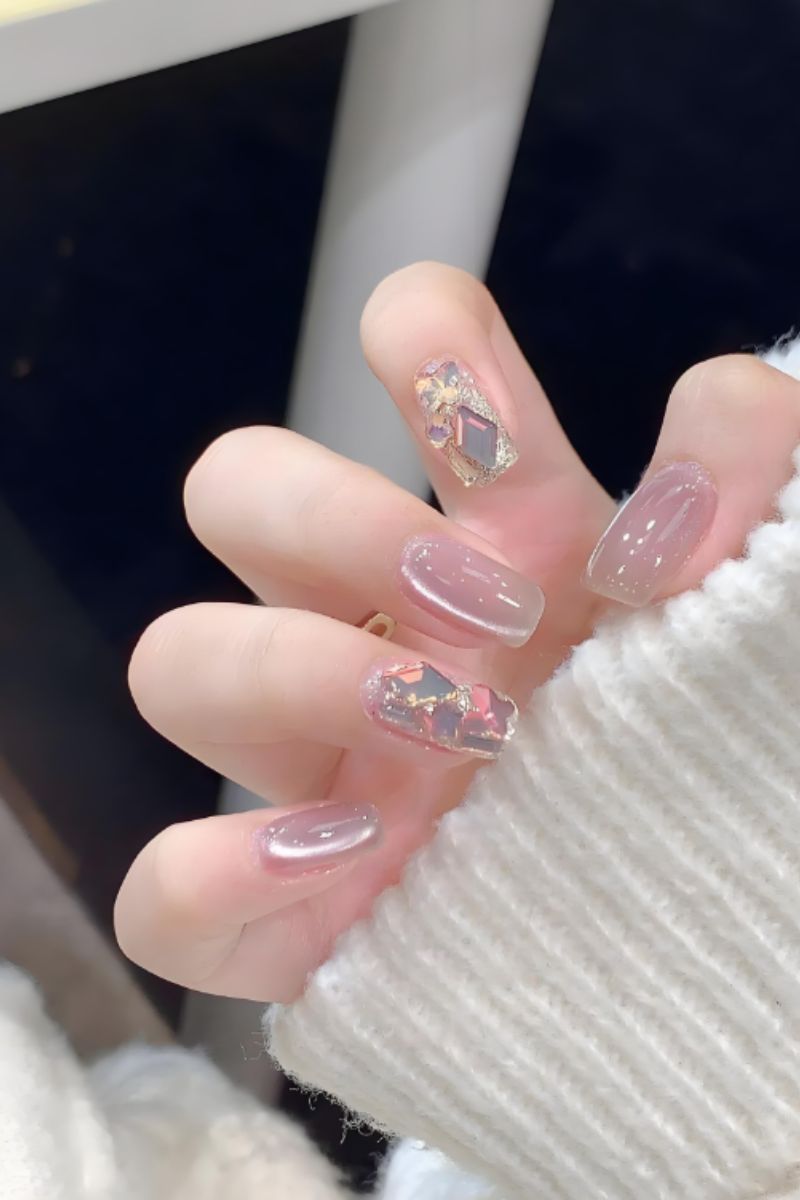 Ảnh nail tay mắt mèo 6